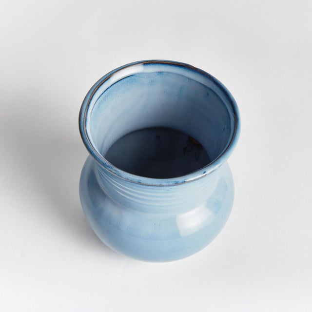 What makes this pot unique is the deep, aqueous reactive glaze. Made of a highfired stoneware, the rich depth of color is...