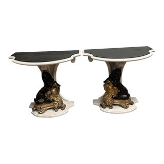 Pair of White Paint Plumed Console Tables With Black Slate Tops and Bottoms of Gilt Bronze 19th Century French Chenet Chenets of Lions and Flames For Sale