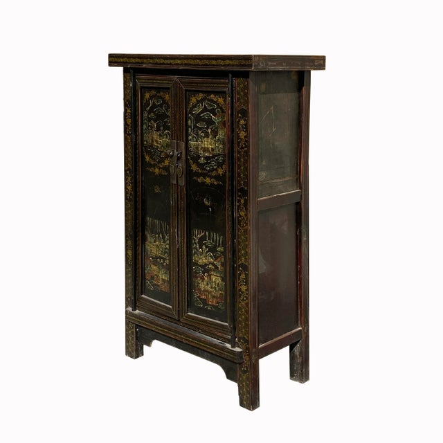 This is an old vintage Chinese accent storage cabinet with distressed black dark brown and color mixed floral scenery...