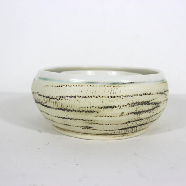 Width: 6.25 inches Height: 2.75 inches Vintage handmade pottery pansy ring or ikebana vase or chips and dip, crackers...