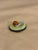 This is a porcelain limoges box. It depicts an escargot with a light detailing inside. It was curated and hand painted in...