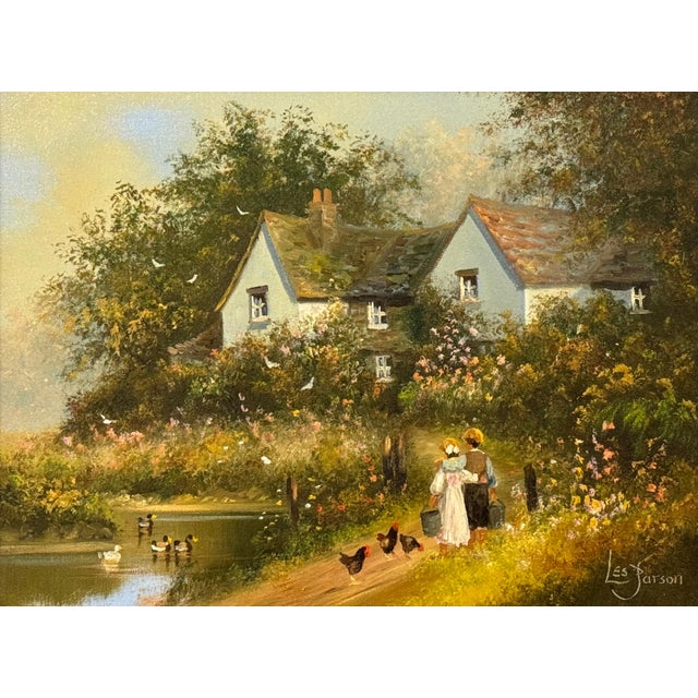 Children holding pails with chickens by a duck pond & cottage in Rural England 1980 Circa For Sale - Image 9 of 18