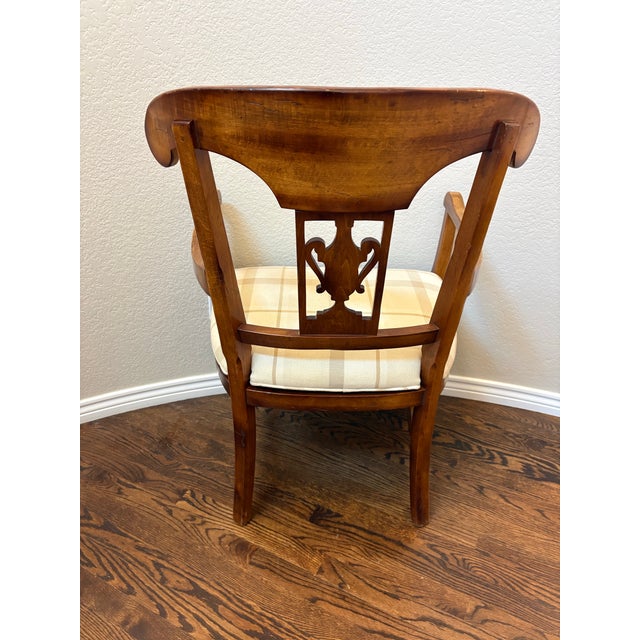 Crafted by Milling Road, a division of Baker Furniture, this elegant vintage armchair showcases the timeless craftsmanship...