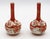Circa 1870 pair of small bottle form Kutani vases, Japan. Delicate, long, narrow necks to bulbous bodies. Decorated with...