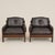 A handsome Danish Modern living room suite comprising a three-seat sofa and matching pair of lounge chairs, crafted in...