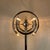 A striking and sculptural floor lamp made of chromed metal tubes with six light bulbs and a heavy marble base. Design...