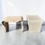 Stunning vintage sculptural pencil reed side tables. This piece is a 1980’s boho-chic pair of wooden end tables, with...