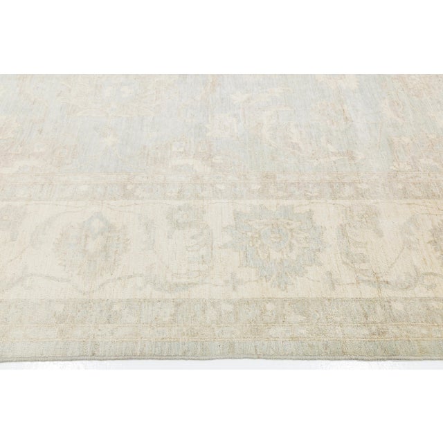 Hand-Knotted Modern Peshawar Wool Rug – Muted Light Blue & Cream Floral Design For Sale In New York - Image 6 of 11