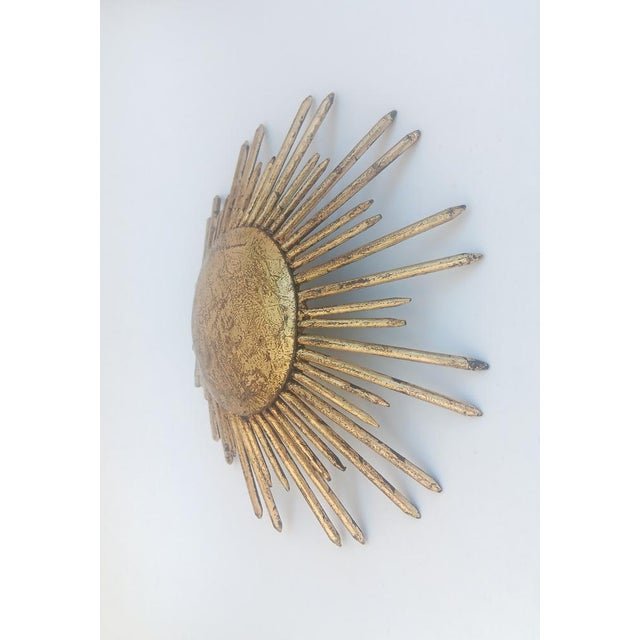 Small Spanish Gold-Leaf Gilt Metal Sunburst Fixture or Sconce, 1960s, in Very Good conditions. Designed 1960 to 1969 Up to...