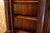 This English-made monumental breakfront bookcase from the 1870s is a magnificent example of 19th-century craftsmanship and...