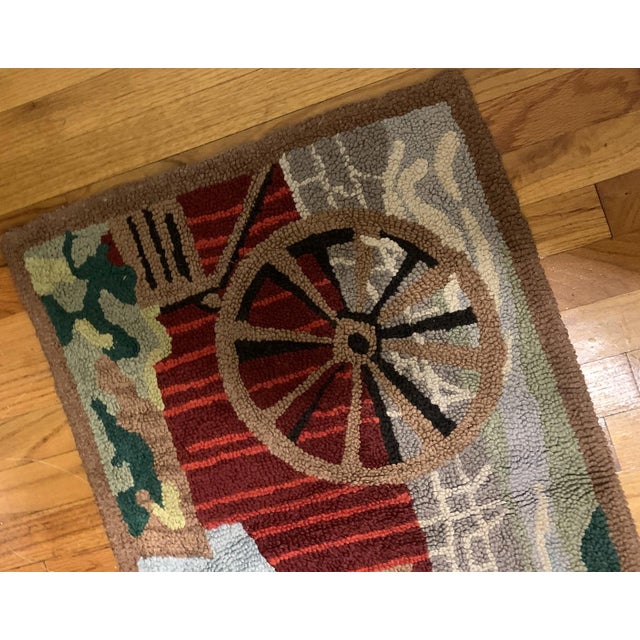 Handmade antique American Hooked rug in colorful shades. The rug is from the beginning of 20th century in original good...