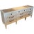 This piece is a French Country / Louis XVI–inspired triple dresser with elegant, refined lines and a light, airy presence.