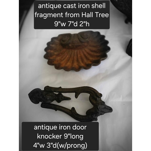 Great looking antique cast Iron shell and antique cast Iron door knocker.