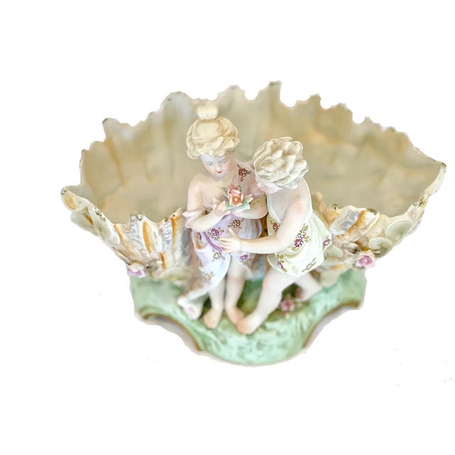 This pristine bisque porcelain planter is almost too beautiful to put plants in. The attention to detail is clear; just...