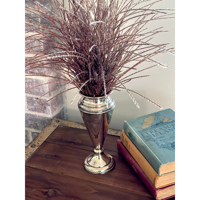 Bring classic traditional elegance to your mantle, entry console, or dining tablescape with this striking vintage silver-...