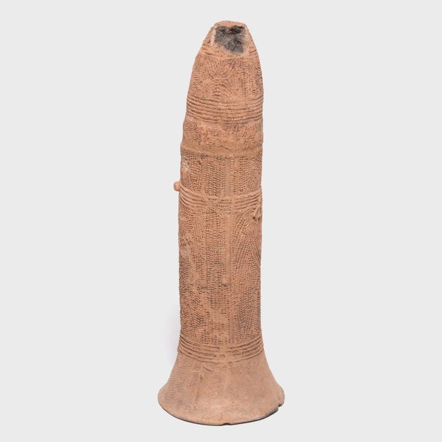 Sometimes called a "Bura bell" due to its shape, this sculptural terra cotta object was part of the Bura tribe's burial...