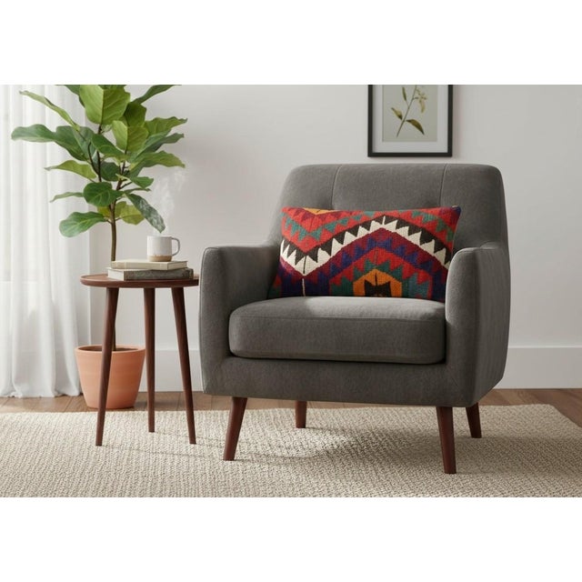 Add a touch of history and warmth to your space with this vintage handmade Turkish wool kilim cushion cover. Crafted from...