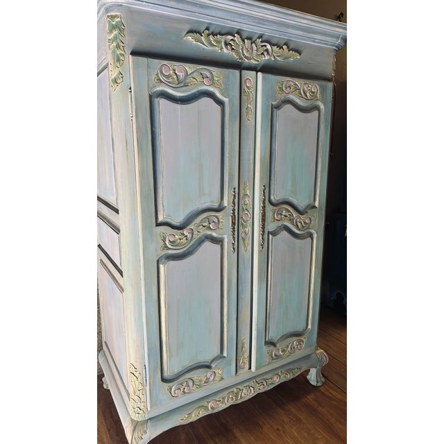 Add a touch of whimsical elegance to your space with this blue lavender stunning, custom-reimagined French Provincial...