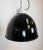 - Industrial lamp made during the 1950s - Black enamel shade, white enamel interior - Porcelain top with glass cover -...