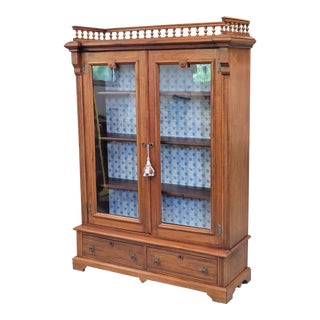 Antique Walnut Glass Door Bookcase With Blue Interior For Sale