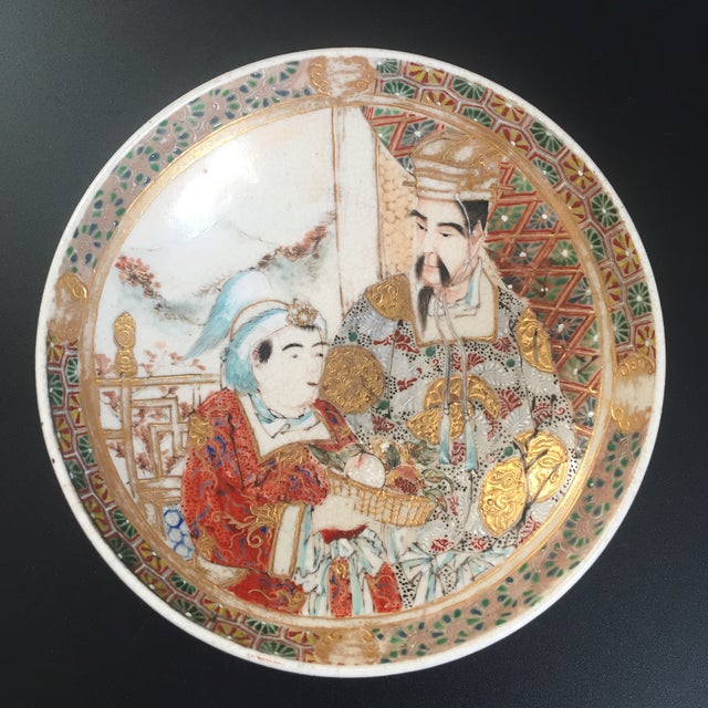 A stunning set of two antique Imperial Satsuma bowls, decorated with raised gold gilt, Gosu blue, white, and red enamels,...