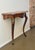 This Louis XV wall console is beautifully made with well executed cabriole legs mounted with brass “chabottes” and it has...