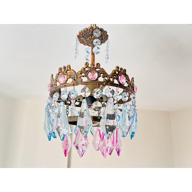 French vintage Brass Crown & Hand-Painted Pink/Blue Crystal Pendant Light A enchanting small vintage crown chandelier...