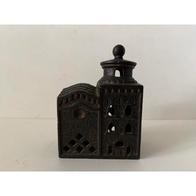 Wonderfully intricate small cast iron still bank of a castle or domed building. Great estate sale find for a still bank...