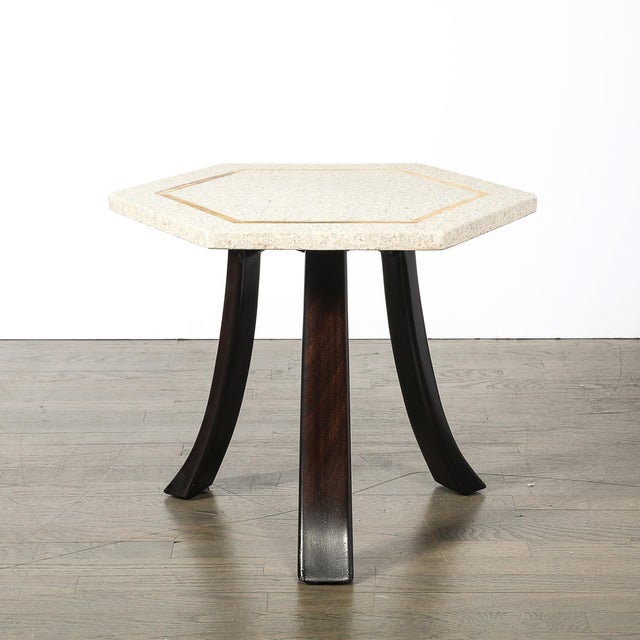 This unique Mid-Century Modernist Hexagonal Terrazzo Side Table W/ Brass Inlays & Curved Ebonized Walnut Supports by...