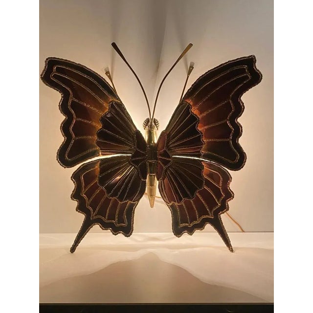 Brass butterfly sconce attributed to Henri Fernandez. Requires four E14 base up to 40watt bulbs ( included ) Can be hard...