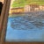 Paint 1980s Michael Donelan Watercolor "Grenada Seaside" — Panoramic Dark Wood Frame For Sale - Image 7 of 12