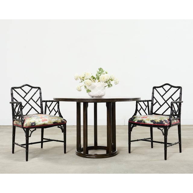 Versatile mid-century round oak and rattan dining or games table made in the California coastal organic modern style by...