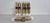 Set of 3 wall lamps (1/2/3) in brass and opal glass from the 1960s. Widths: 6/12/18 cm. Each glass shade contains 2 light...