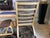A pair of vintage mid-century Danish modern leather and bentwood beech armchairs and ottomans manufactured by Stouby...
