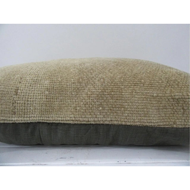 This is a pillow cover made from a vintage kilim rug. The piece was properly washed and ready to use. Pillow inserts not...