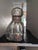 Vintage glass decanter featuring a cork stopper and elegant ribbed design. • Clear glass with a ribbed texture • Round...
