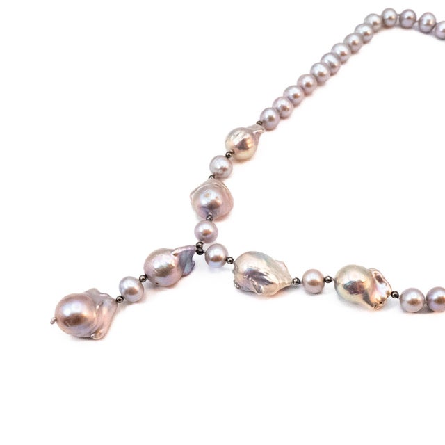 Vintage 18 to 20-Inch Cultured 9.15mm Grey Baroque Pearl Necklace With 925 Clasp. This gorgeous necklace has an adjustable...
