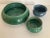 This set of three arts and crafts pottery pieces are pottery studio made and craft in rich colors. They were purchased at...