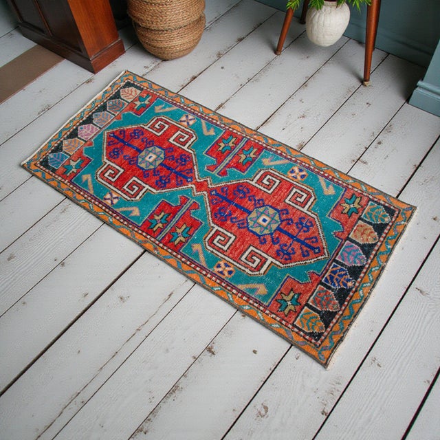 Vintage Turkish hand-knotted small rug from Chal (Denizli), 1970, featuring warm terracotta and turquoise tones and...