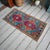 Vintage Turkish hand-knotted small rug from Chal (Denizli), 1970, featuring warm terracotta and turquoise tones and...