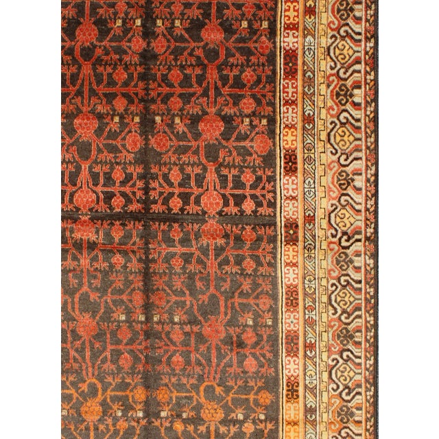 Keivan Woven Arts, Mp-1610-157652, kwarugs. An antique, early 20th century, Central Asian Khotan rug with traditional all-...