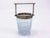 1950s Baccarat-style ice bucket, cut crystal with silver-plated metal trim and a movable handle. This refined table...