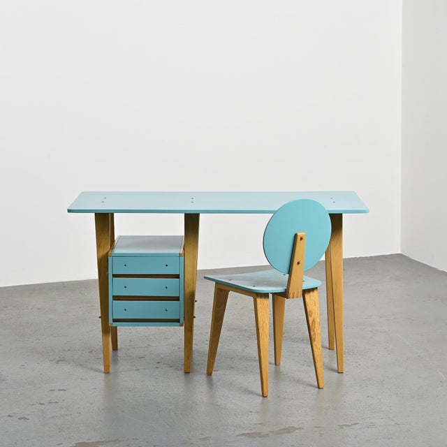 Rare desk and chair set in blue lacquered ash designed by André Sornay, a Lyon-based cabinetmaker and designer, circa...