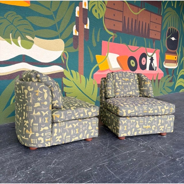 Freshly reupholstered in an insanely fun print, this Henredon Folio 500 pair is a showstopper! It can ground your space...