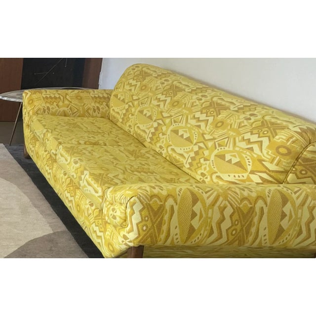 Vintage Gondola Sofa. Walnut legs. Reupholstered in 1960s vintage deadstock fabric.