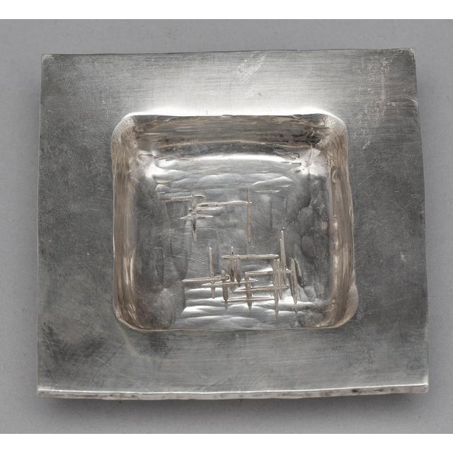 Rey urban mastive silver cindrier, sweden, 1970s. the ashtray is signed and stamped. good condition. This piece has an...