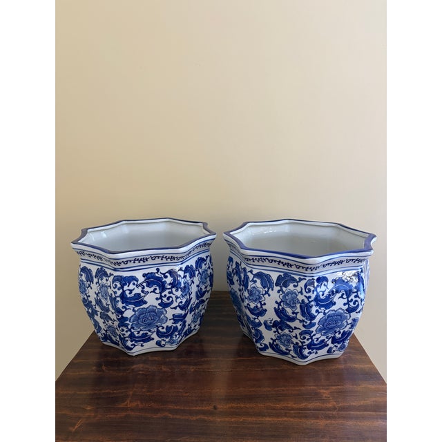 A stunning pair of blue & white porcelain Chinoiserie planters or jardinieres China, 21st century Measures: 12.5"W x...
