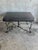 A striking mid-century bench featuring a hand forged hammered iron base with an organic branch-form structure. Four...