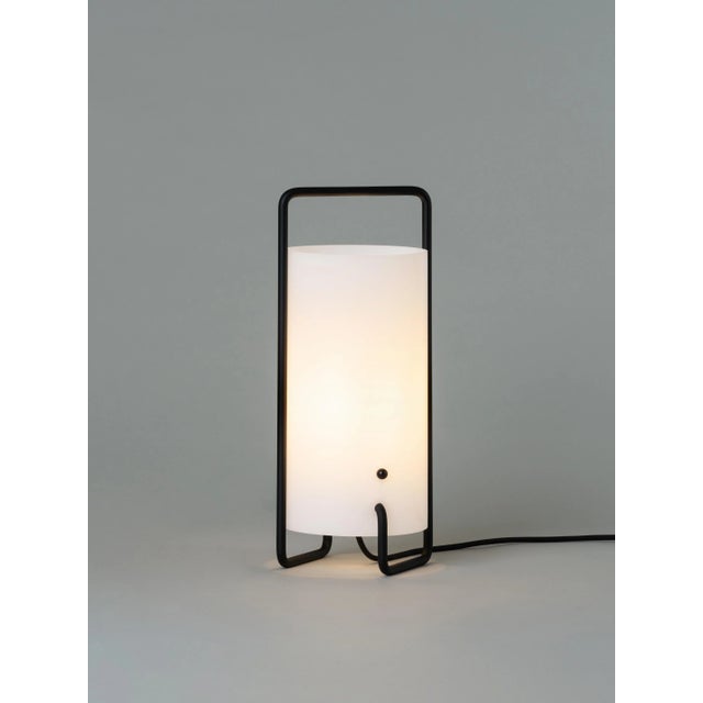 Black asa table lamp by miguel milá dimensions: d 15 x h 41 cm materials: metal, methacrylate shade. Asa is built of an...
