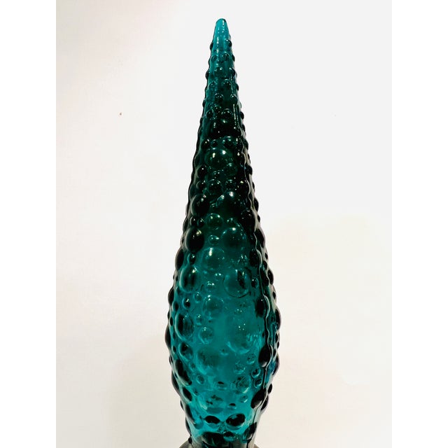This is a seriously swaggy vintage decanter! love the teal color and the bubble texture! So groovy.